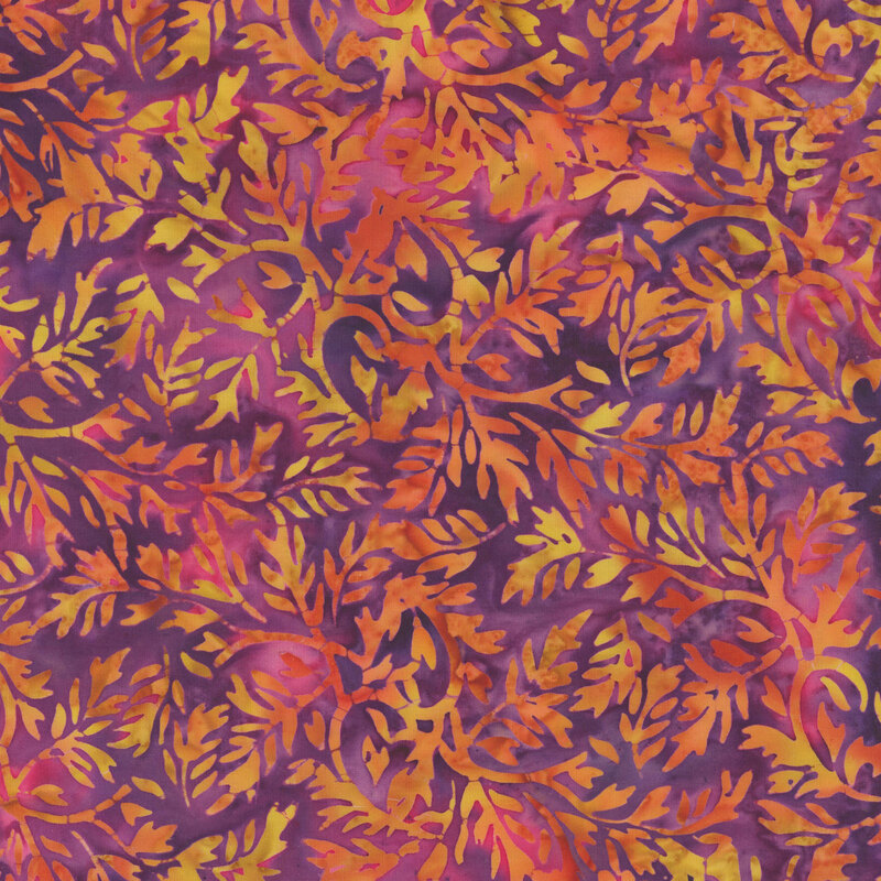 A violet and hot pink batik with light orange leaves. 