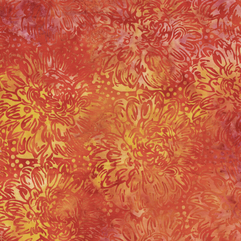 A grapefruit red and light orange batik with dahlias. 