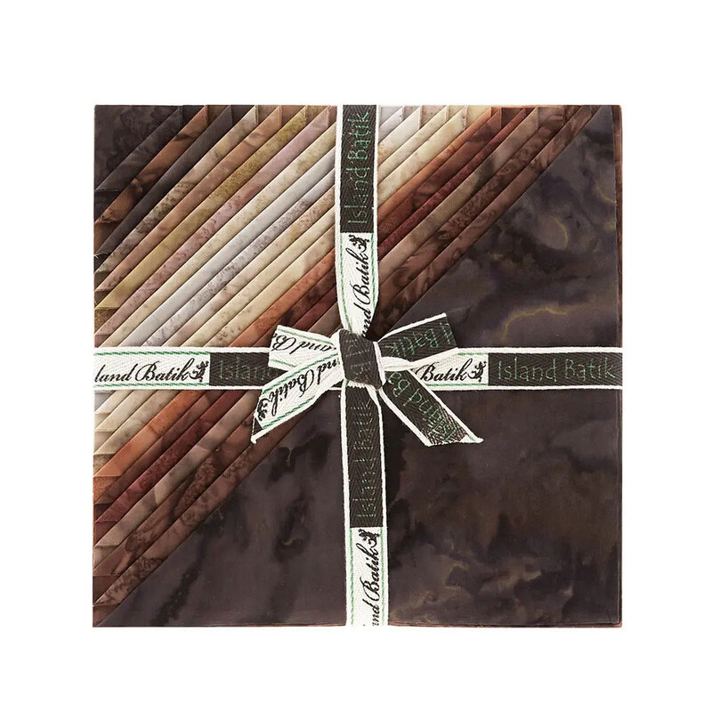 Layered stack of brown, taupe, and cream mottled fabrics with the left corners folded, tied in an “Island Batik” ribbon.