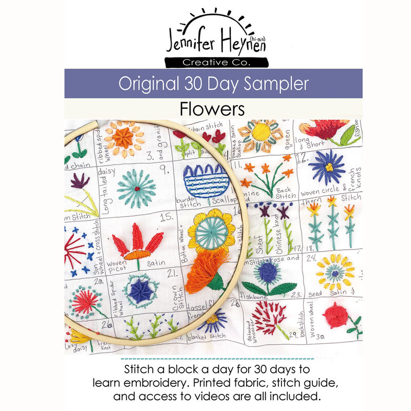 The front of the Original 30 Day Sampler - Flowers showing examples of completed embroidered blocks