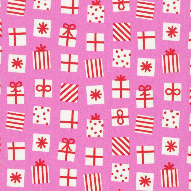 Fuchsia pink fabric featuring a pattern of white and red presents decorated in stripes dots, and bows.