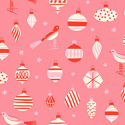 Salmon pink fabric featuring vintage style ornaments, birds, and stars in hues of red, cream, and blush.