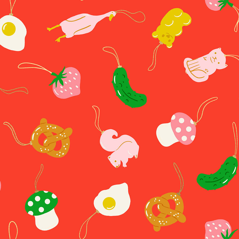 Scarlet red fabric featuring a tossed pattern of animal and food themed ornaments with metallic accents.