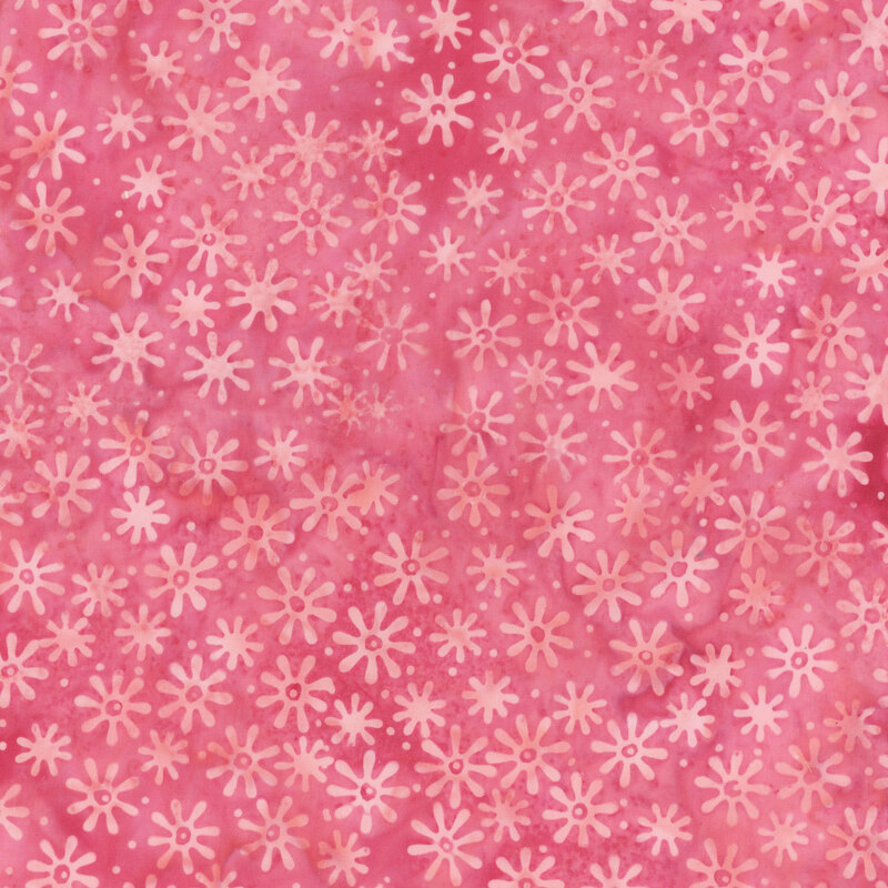 Mottled garnet pink fabric features a blend of tonal, stylized florals.