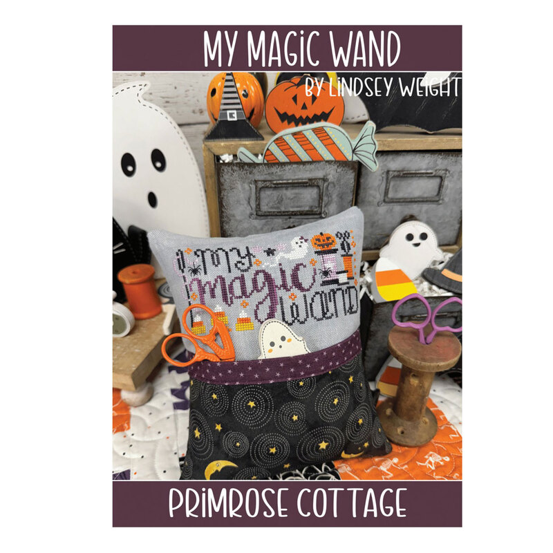 Front of the My Magic Wand pattern featuring the finished project staged with halloween decor.