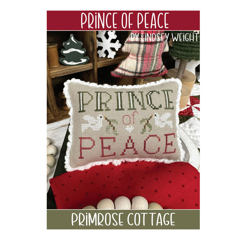 Front of the prince of peace pattern featuring the finished project staged with holiday decor.