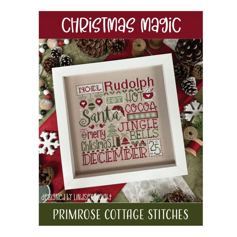 Front of the Christmas Magic pattern showing the completed design framed and staged with coordinating decor.