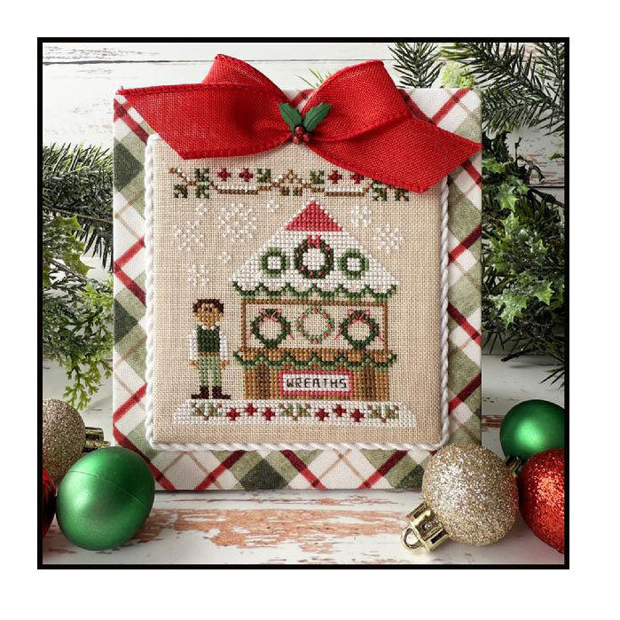 Finished pattern project staged with Christmas decor.