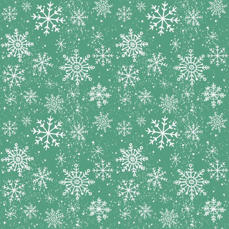Green fabric adorned with white snowflakes in a variety of sizes and styles.