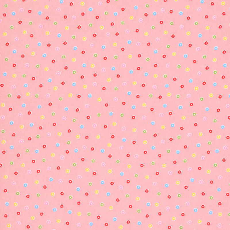 Pink fabric with a scattered pattern of colorful flower buds.