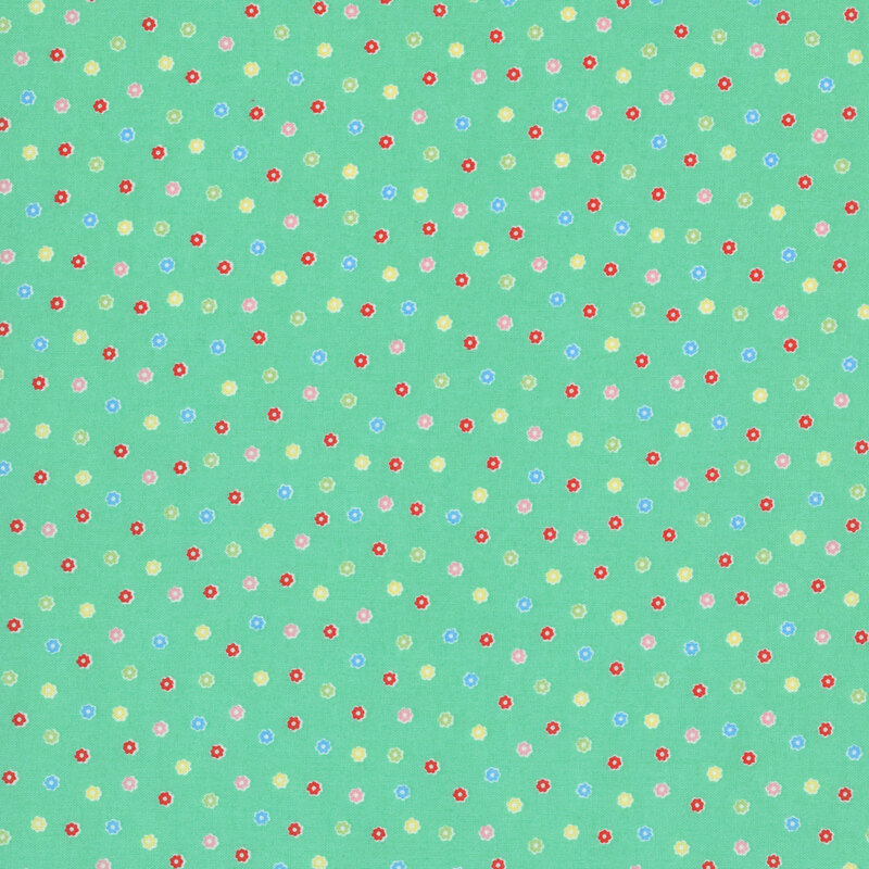 Green fabric with a scattered pattern of colorful flower buds.