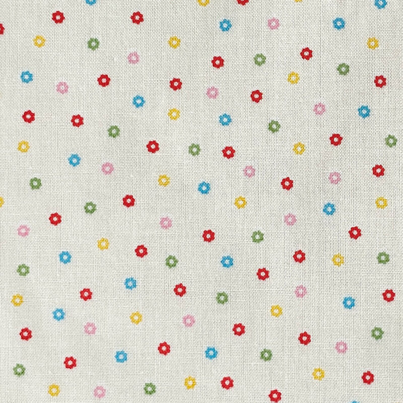 White fabric with a scattered pattern of colorful flower buds.