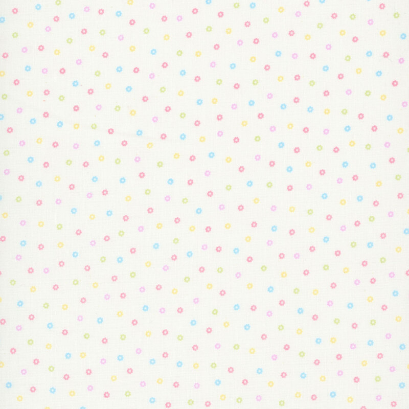White fabric with a scattered pattern of colorful flower buds.