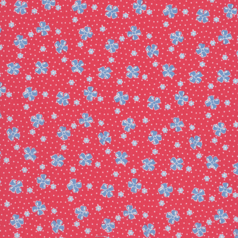Bright red fabric features a vintage-style pattern of floral buds set against a dotted background.