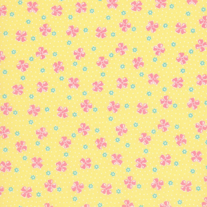 Yellow fabric with a vintage-style pattern of floral buds set against a dotted background.