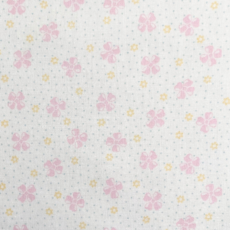 White with a vintage-style pattern of floral buds set against a dotted background.