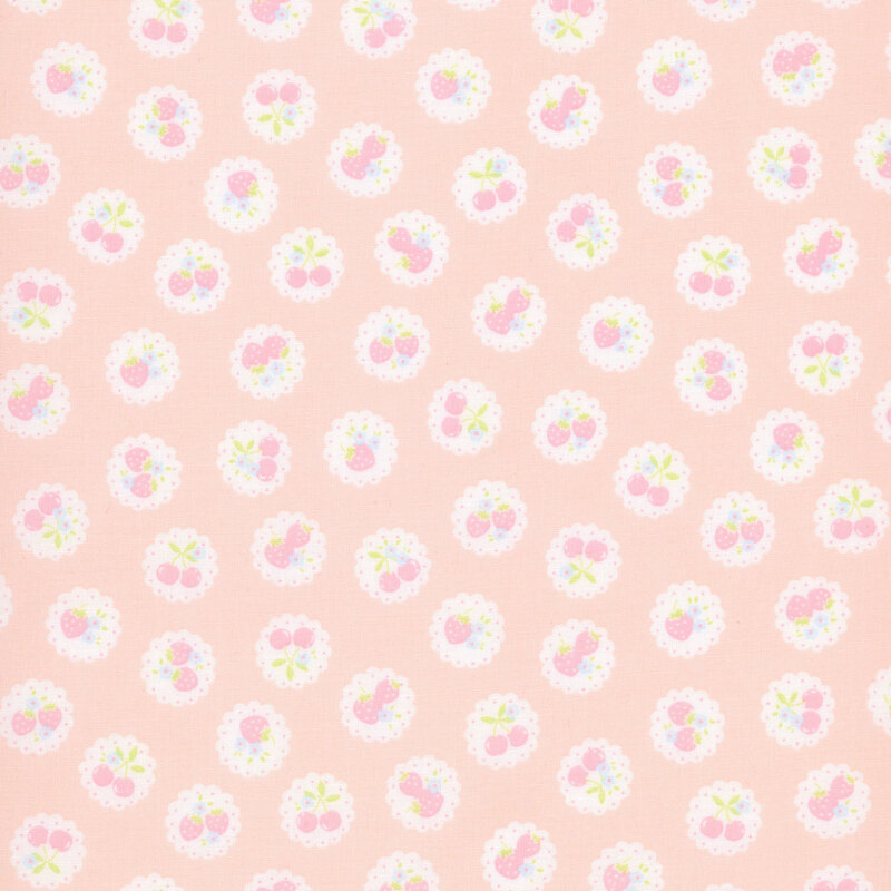 Light pink fabric with a pattern of vintage-style medallions filled with assorted fruits like cherries and strawberries.