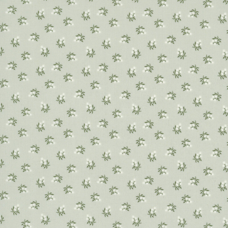 Mint green fabric with a tossed pattern of stylized white florals.
