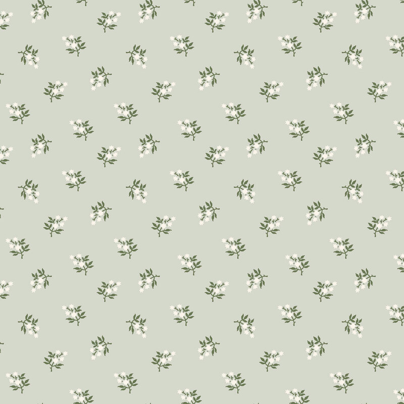 Mint green fabric with a tossed pattern of stylized white florals.