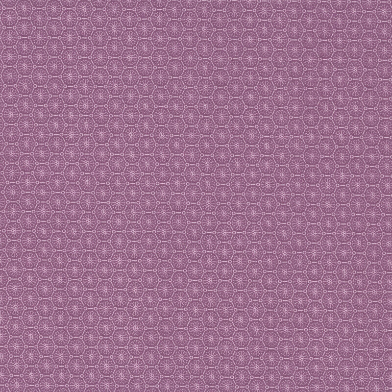 Purple fabric with a stylized geometric design of abstract flowers arranged within an octagonal lattice.
