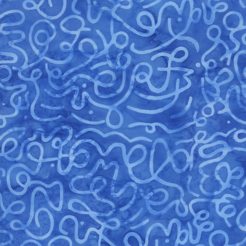 Lapis blue watercolor batik fabric with a bright blue overlay of squiggles