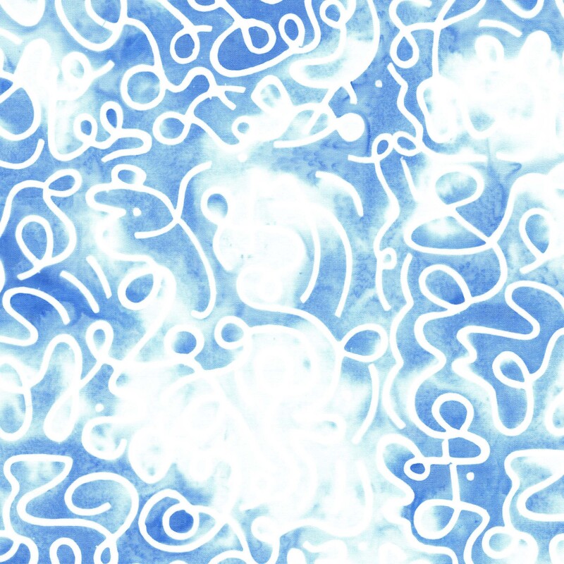 Blue and white mottled batik fabric with an overlay of white squiggles
