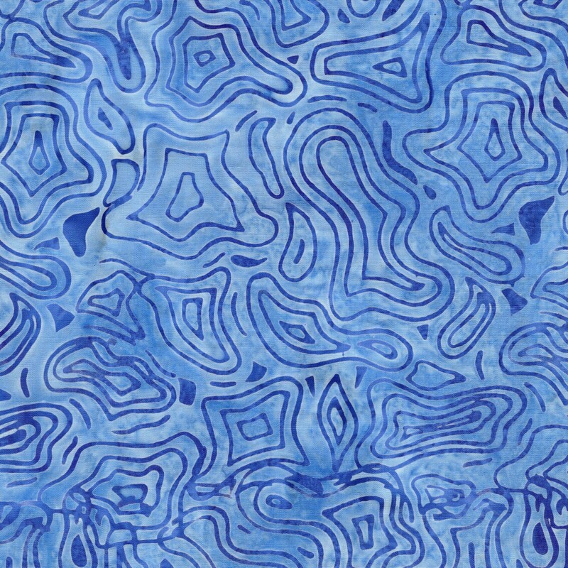 Mottled sky blue batik fabric with an overlay of azure lines resembling a topographic map