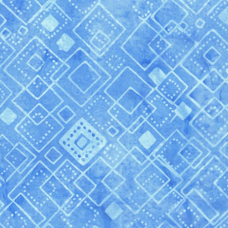 Mottled sky blue batik fabric with a tonal overlay of diagonal squares and dot shapes