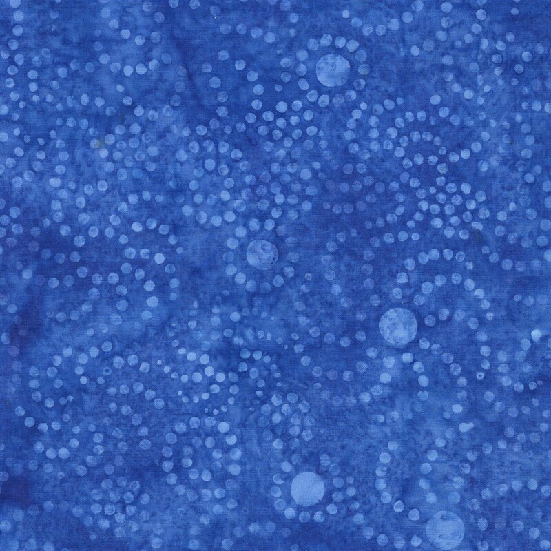 Watercolor azure batik fabric with a tonal overlay of circles and dots in whirl designs