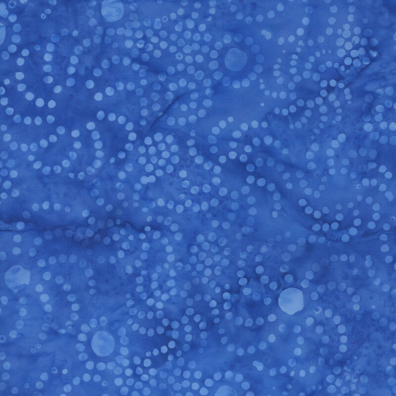 Watercolor azure batik fabric with a tonal overlay of circles and dots in whirl designs