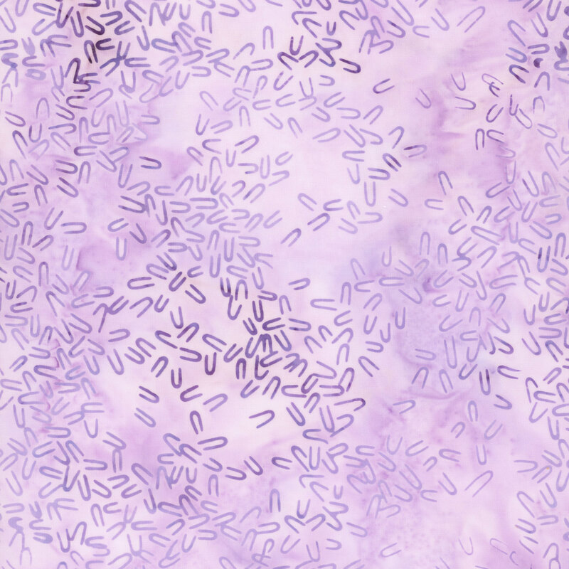 Mottled lavender fabric with tonal hairpin shaped motifs scattered throughout.