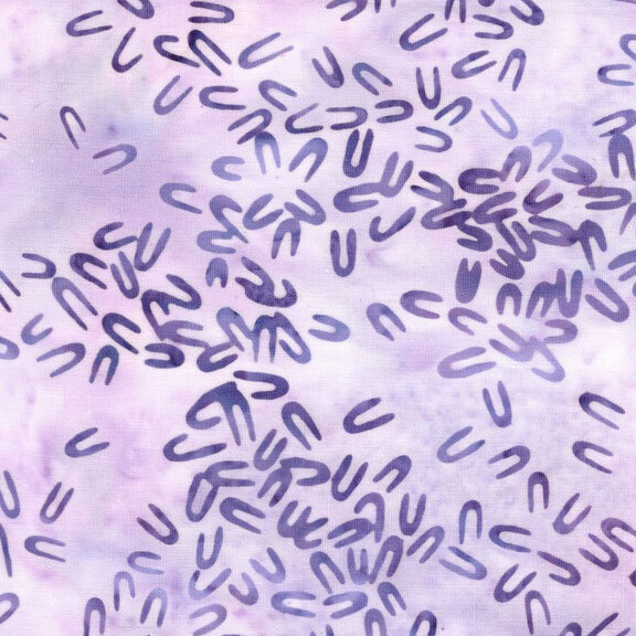 Mottled lavender fabric with tonal hairpin shaped motifs scattered throughout.