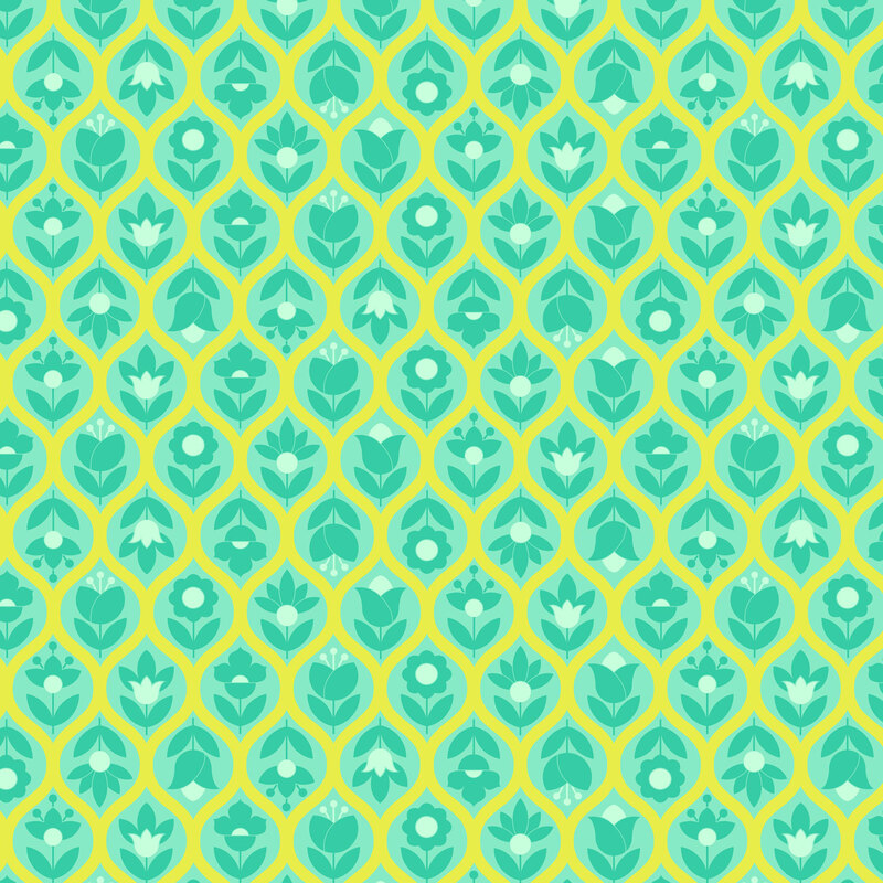 This citron fabric features an aqua ogee lattice filled with stylized floral and leaf motifs.