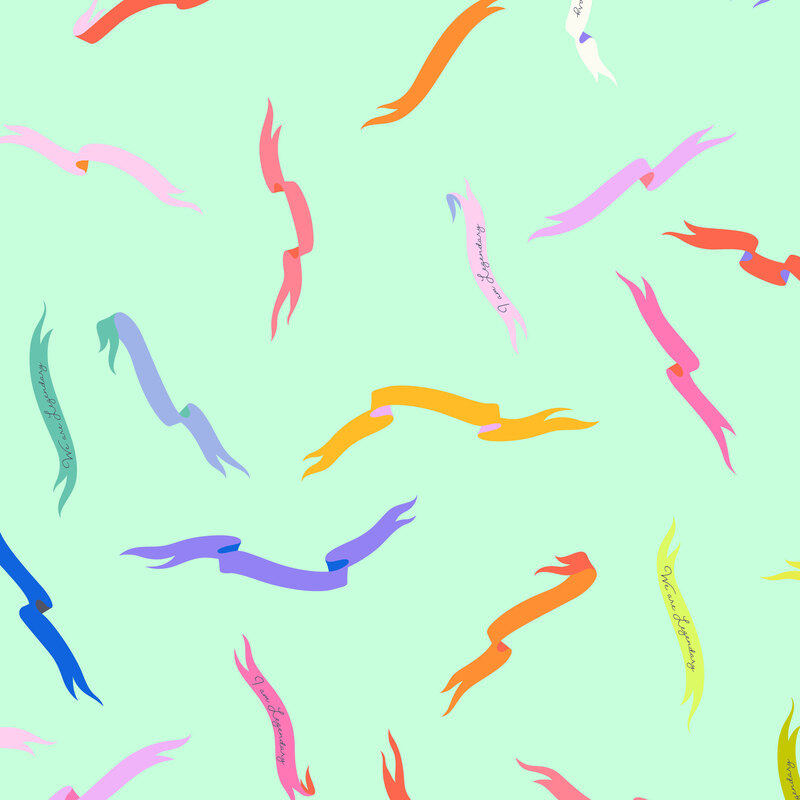 This mint aqua fabric features vibrant, multicolored ribbons, some read' "We are Legendary".