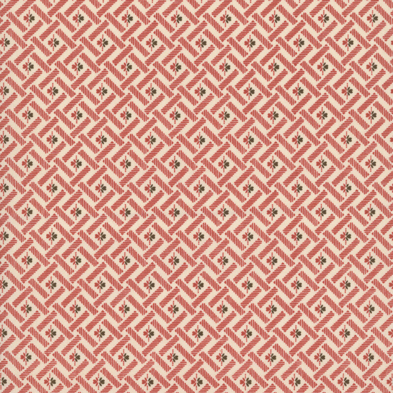 Cream fabric with a red basketweave pattern with red and black flowers in the center