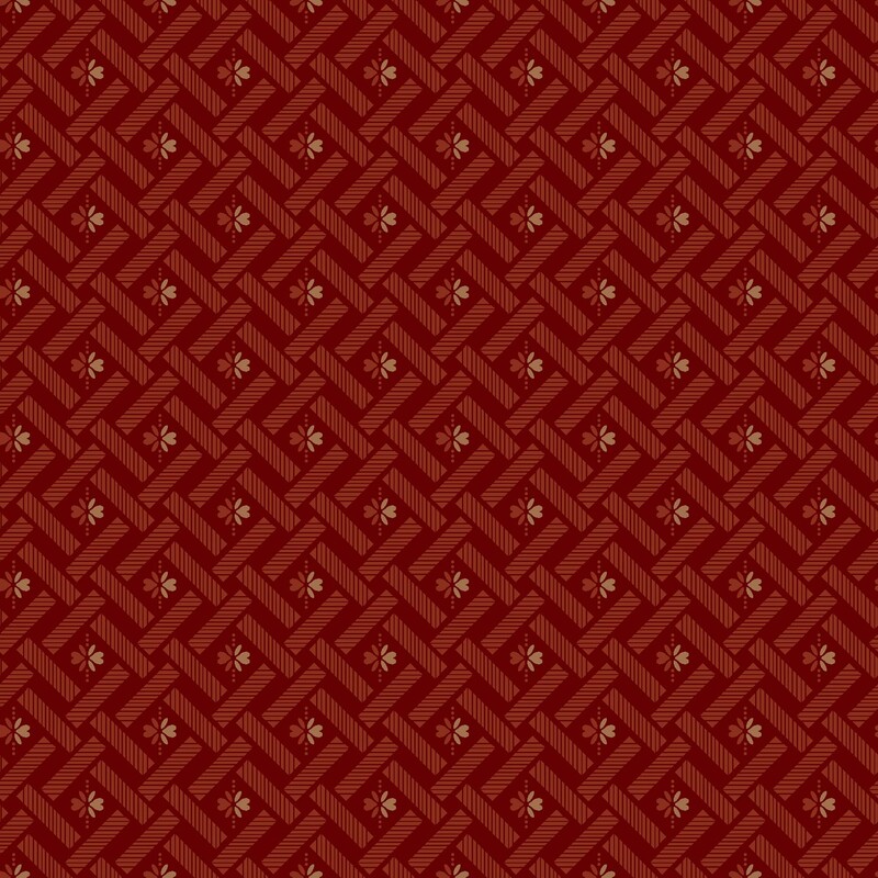 Deep red fabric with a scarlet basketweave pattern with red and beige flowers in the center