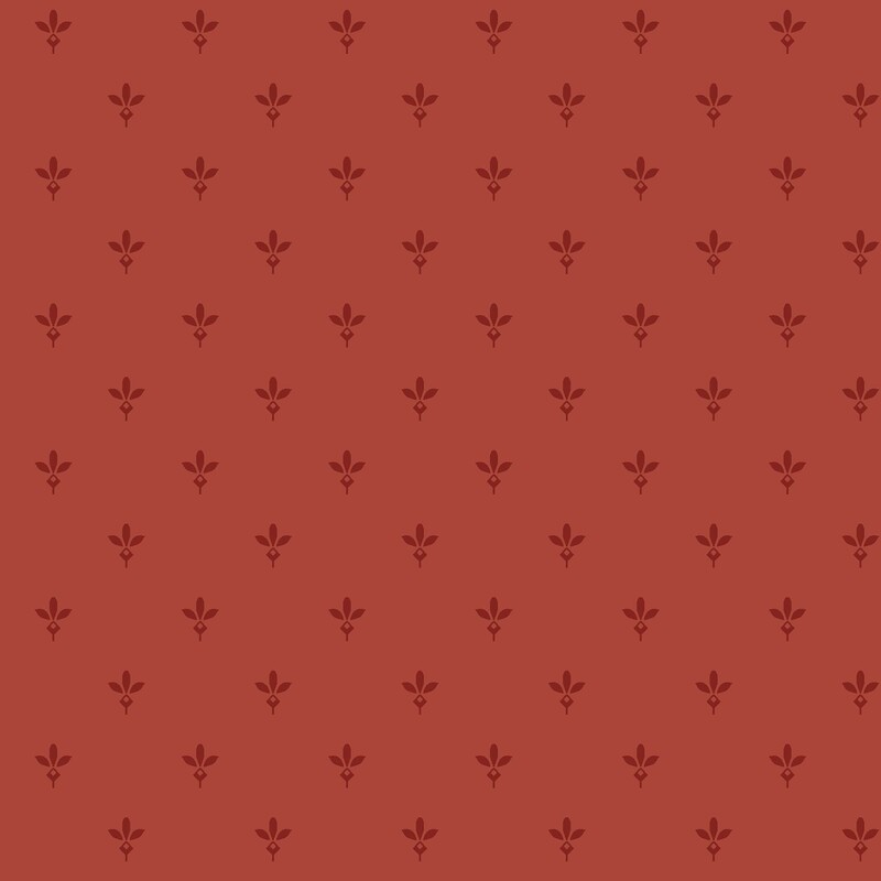 Strawberry red fabric with a pattern of primitive dark red leaf motifs