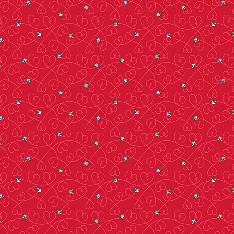 Ruby red fabric featuring swirling tonal lines with hearts and little bumble bees