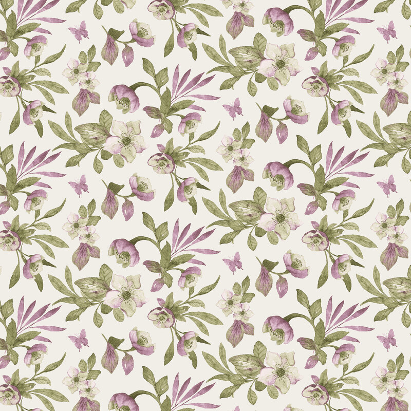 Hellebores tossed onto a cream fabric.