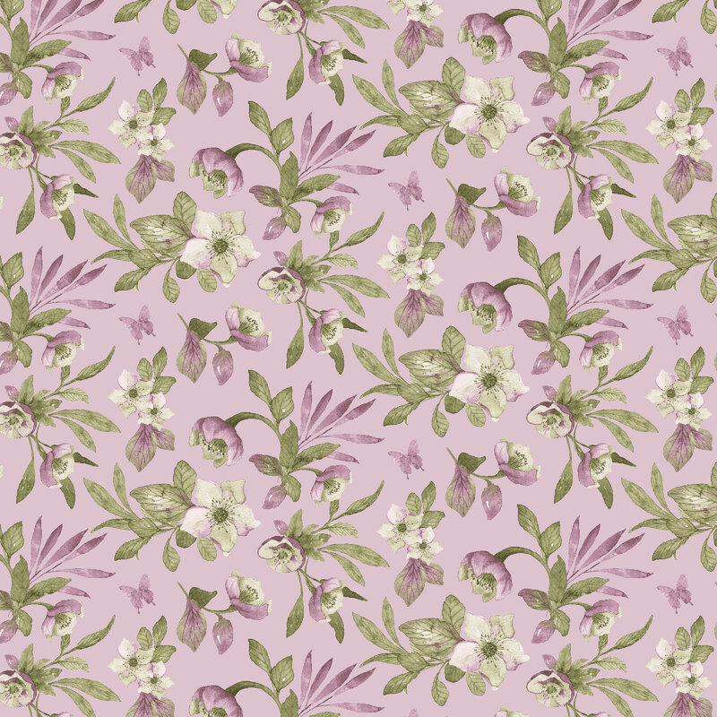Hellebores tossed onto a soft pink fabric.