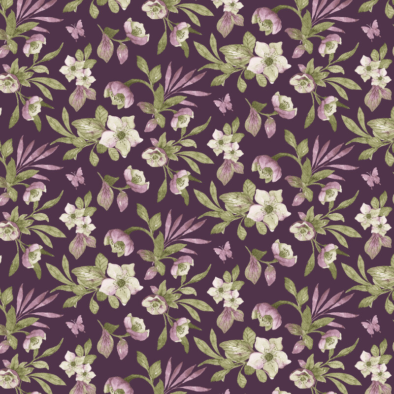 Hellebores tossed onto a plum fabric.