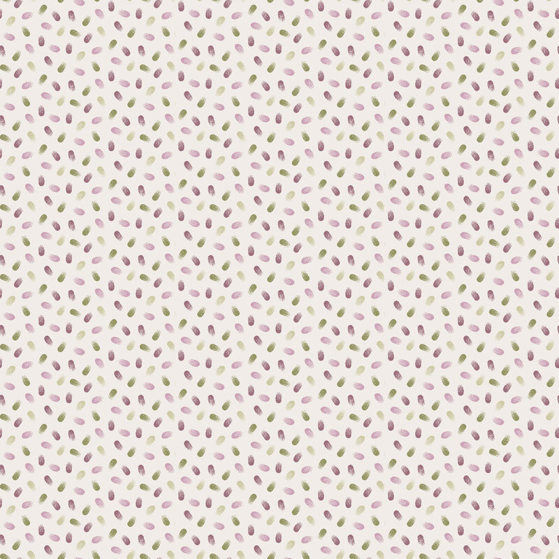 Multi colored paint dabs scattered across a cream fabric.