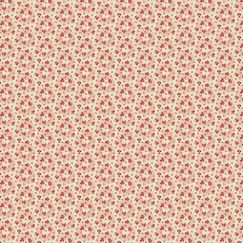 Cream fabric with staggered pattern of dotted circles tossed with stylized red roses.