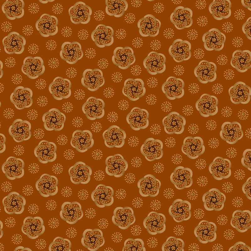 Burnt sienna fabric with scattered latte and dark brown swirling florals and dots.