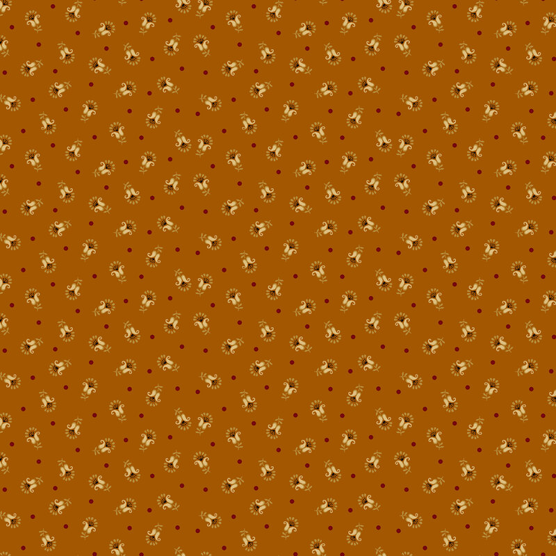 Burnt sienna fabric with scattered red dots and a ditsy pattern of latte colored tulips