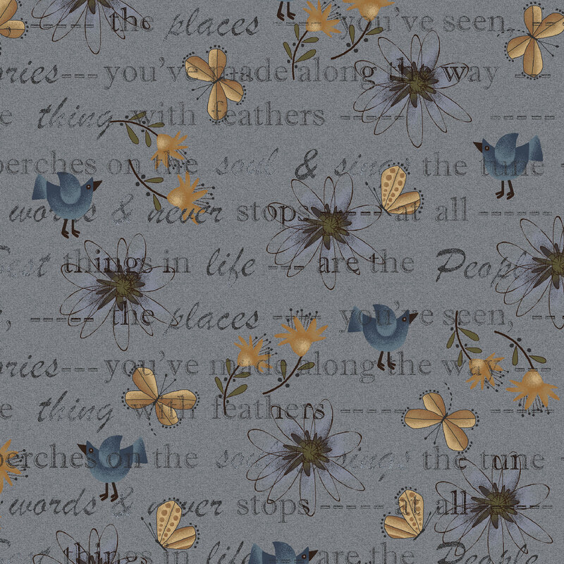 This muted blue-gray fabric features tossed flowers, blue birds, and butterflies layered over typed words, creating a design filled with charm and natural beauty.