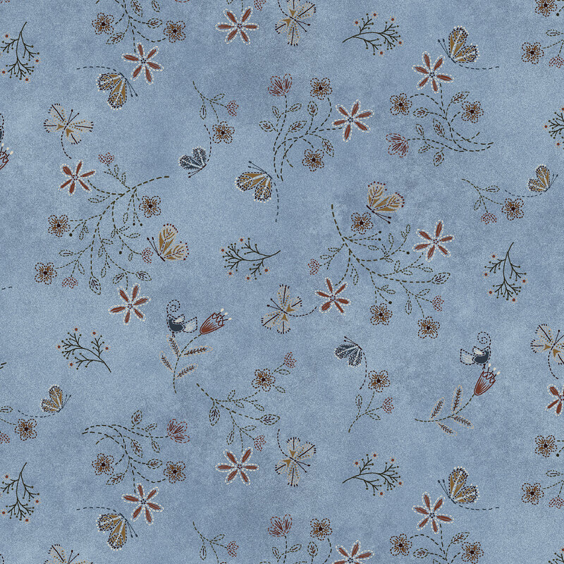 This blue fabric features tossed florals, the occasional blue bird, and fluttering butterflies. 