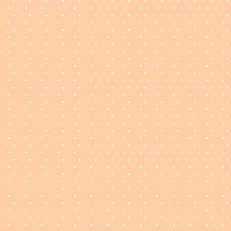 Pastel peach fabric with white and light orange polka dots