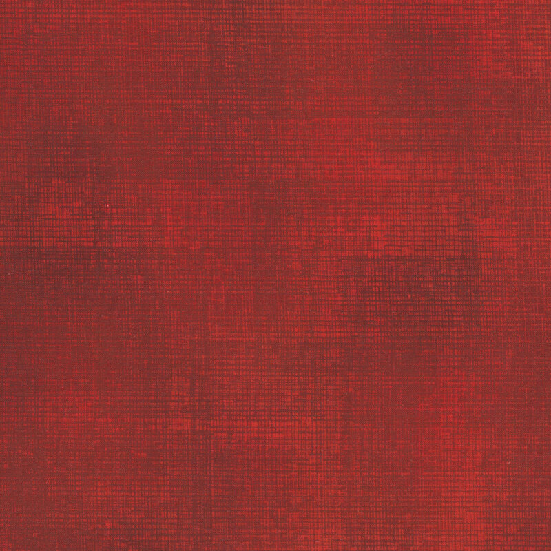 Swatch of ruby red fabric with tonal thatched texturing.