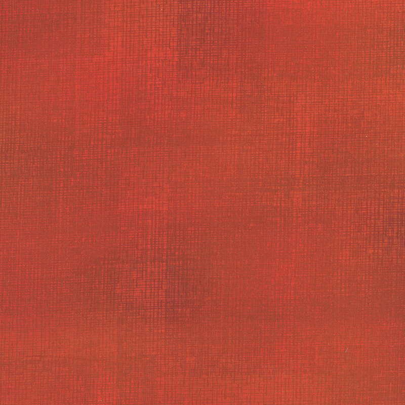 Swatch of tomato red fabric with tonal thatched texturing.